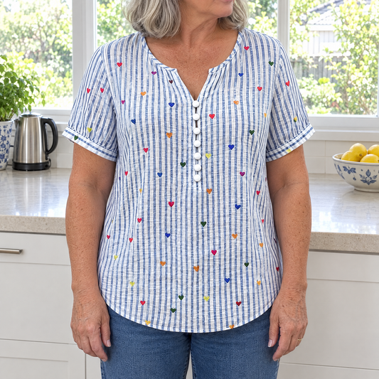 Olivia striped blouse with heart print worn by an Australian woman