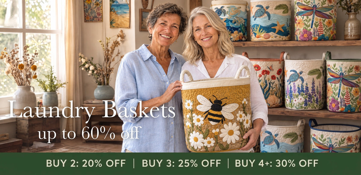 Laundry Baskets up to 60% off — two women holding the Daisy bee basket in front of shelves of quilted baskets